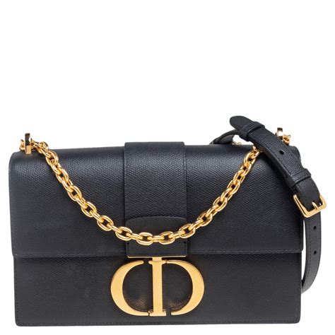 dior black cuf|Dior Black leather bag.